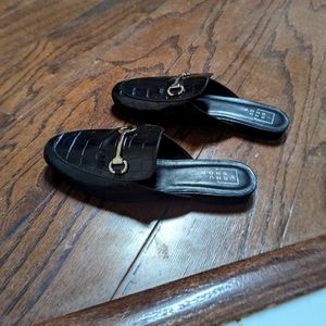 Black buckle mules